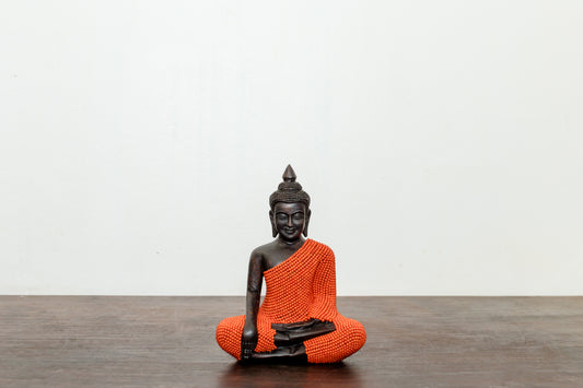 buddha statue Protecting Buddha ,wood, wearing turquoise stones painted orange. He is 8 inches height and 6 inches width at knees.